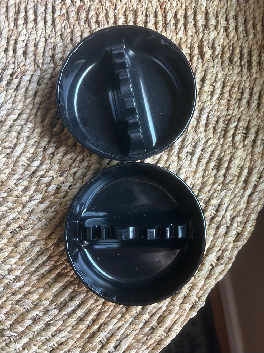 Two ashtrays.
